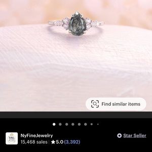 salt and pepper diamond with a 14k rose gold band. Size is 7